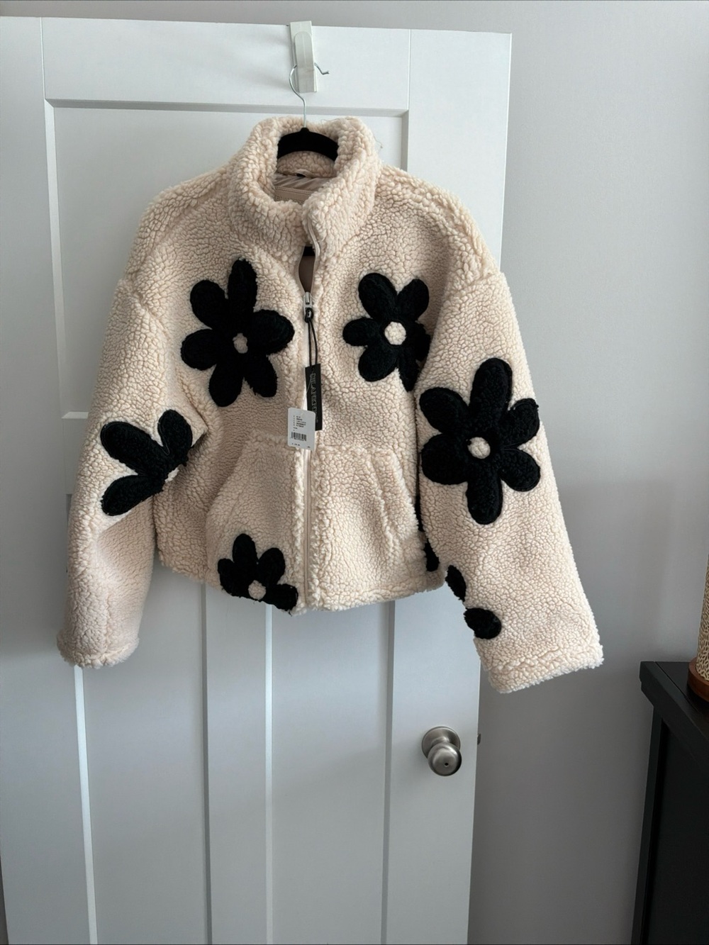 Blank NYC Cream Teddy Jacket with Black Flower Appliqués